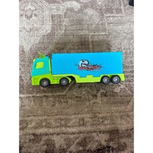 Dinosaur Adventure Transport Truck Toy Foldable Race Track Semi Blue Green